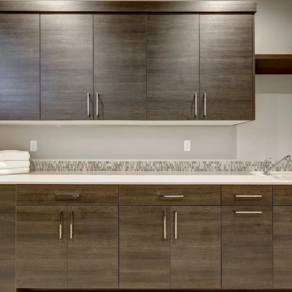 An image of a modern shaker style cabinet wood kitchen.