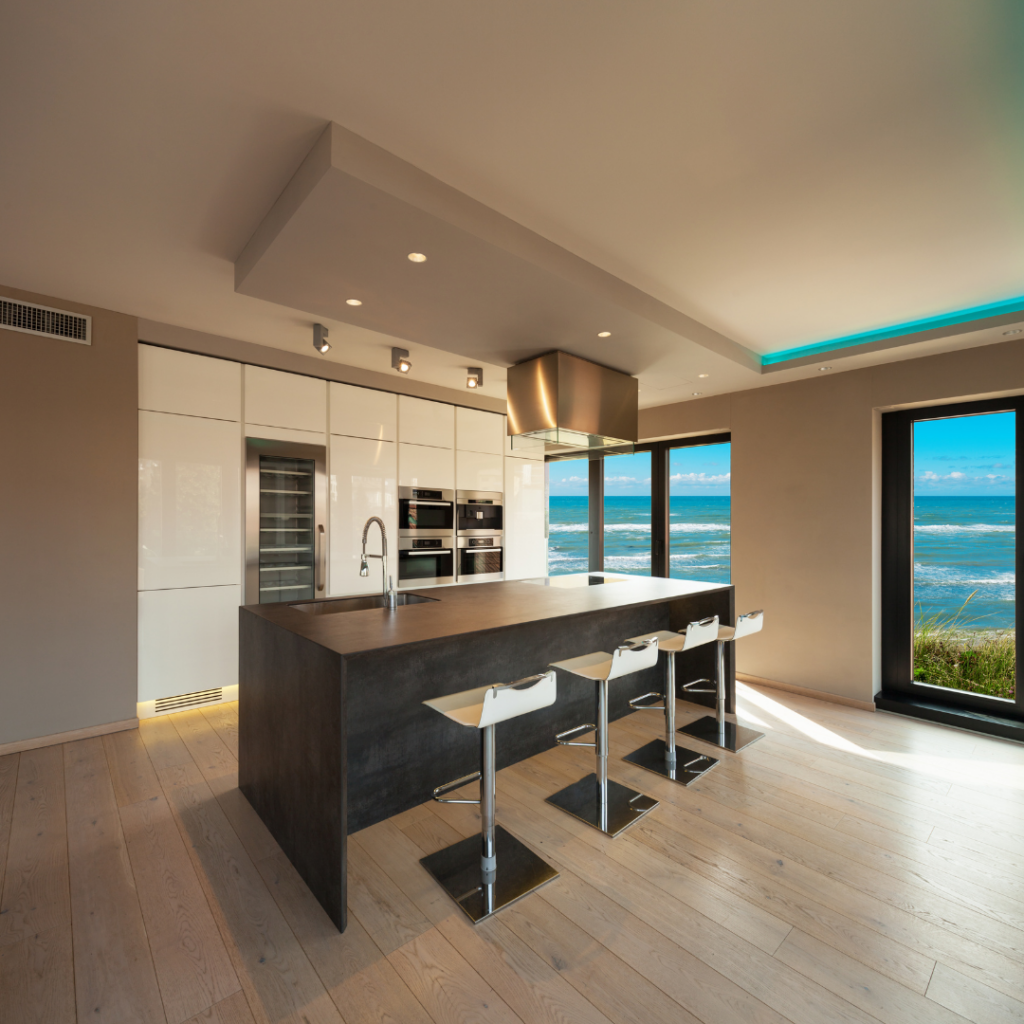 Modern frameless kitchen cabinets in a luxury Charleston oceanfront home overlooking the sea.